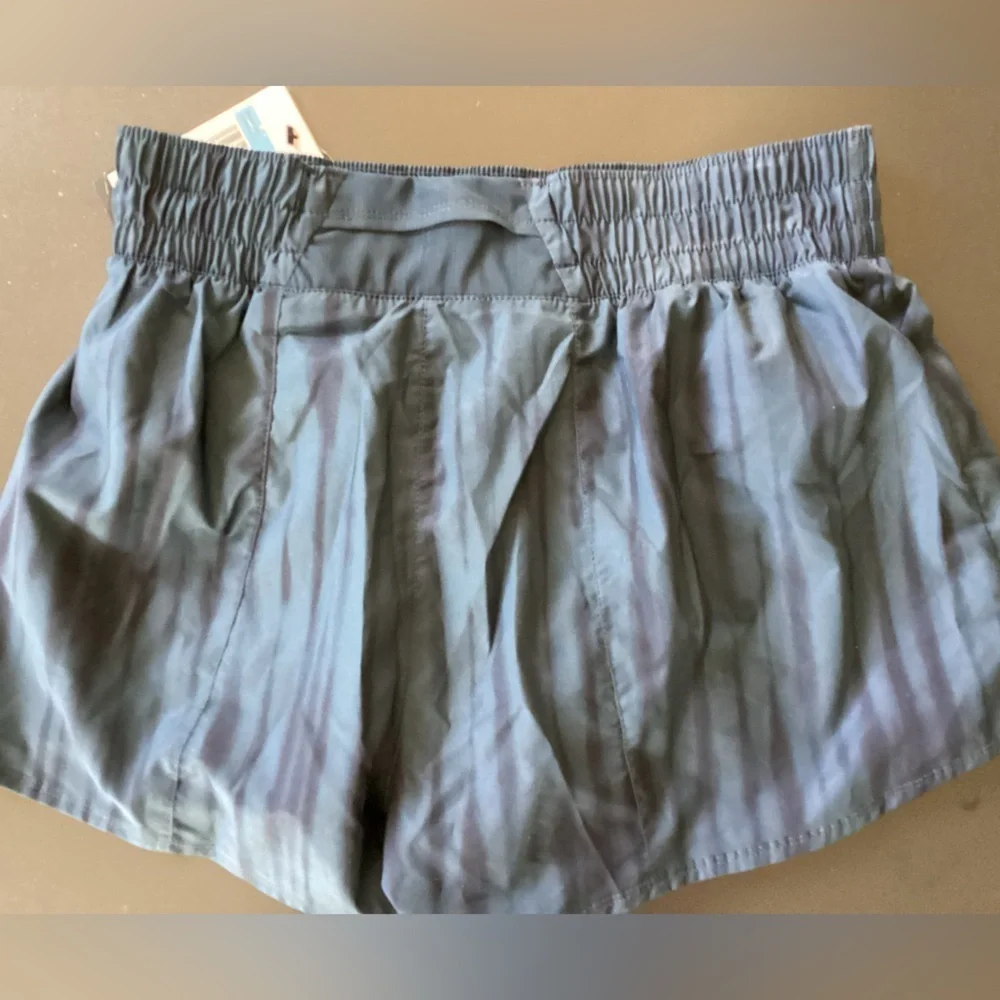 NWT- Nike women’s dri fit lined running shorts- SZ M - Navy Waist 12” Inseam 3”
